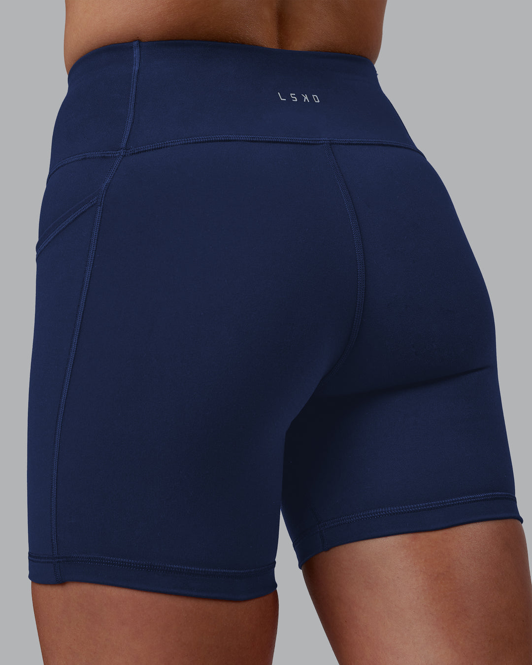Woman wearing Rep Ultra High-Rise 6" Short Pockets No Logo - Future Navy | Model:Shae | Size:S - view 8