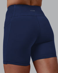 Woman wearing Rep Ultra High-Rise 6" Short Pockets No Logo - Future Navy | Model:Shae | Size:S | Thumbnail Index: 7
