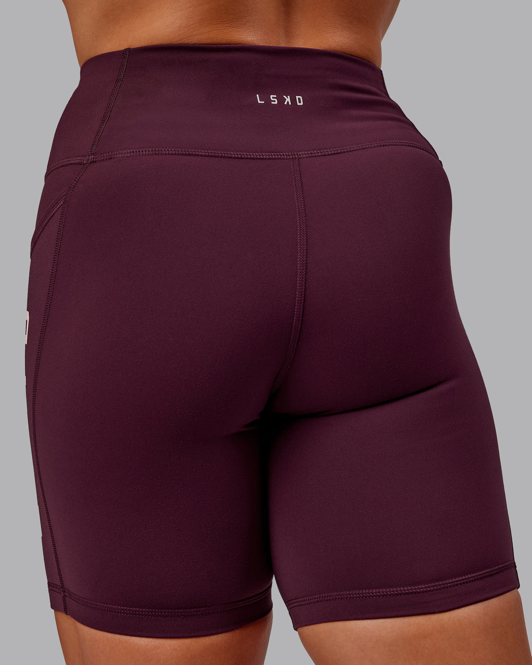 Woman wearing Rep Ultra High-Rise 6" Short Pockets - Cherry Lacquer-Marshmallow | Model:Amber | Size:S - view 8
