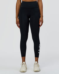 Woman wearing Rep Street Script Ultra High-Rise 7/8 Legging Pockets - Black-White | Model:Rosie | Size:S | Thumbnail Index: 6