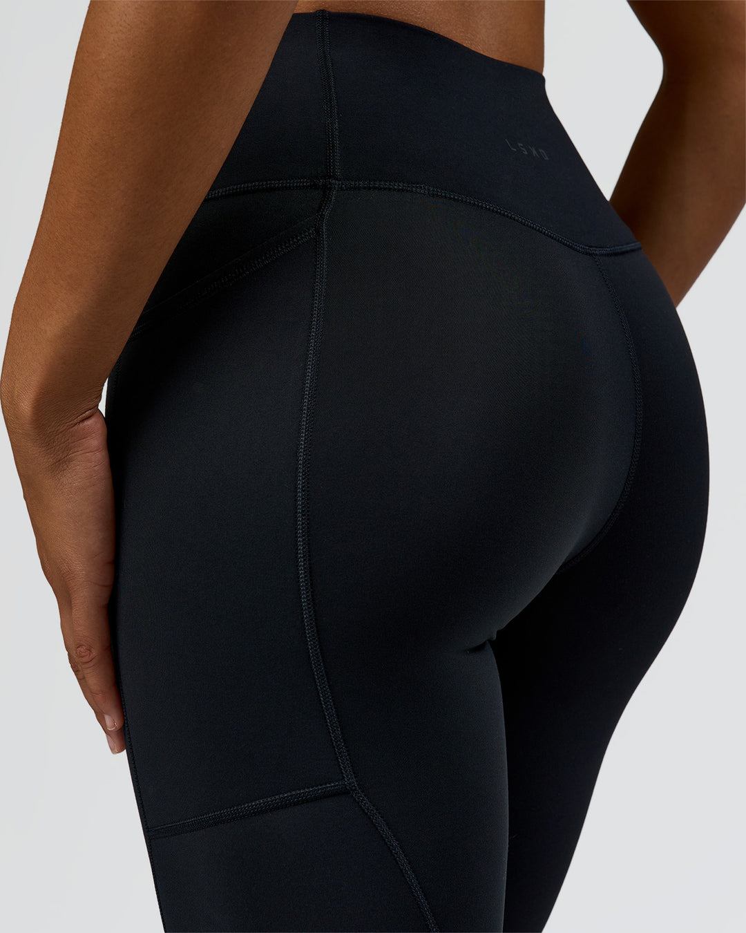 Woman wearing Rep Street Script Ultra High-Rise 7/8 Legging Pockets - Black-White | Model:Rosie | Size:S - view 8