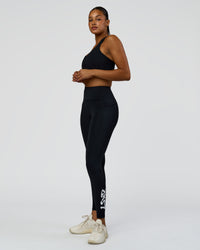 Woman wearing Rep Street Script Ultra High-Rise Full Length Legging Pockets - Black-White | Model:Rosie | Size:S | Thumbnail Index: 5