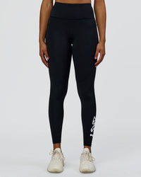 Woman wearing Rep Street Script Ultra High-Rise Full Length Legging Pockets - Black-White | Model:Rosie | Size:S | Thumbnail Index: 7