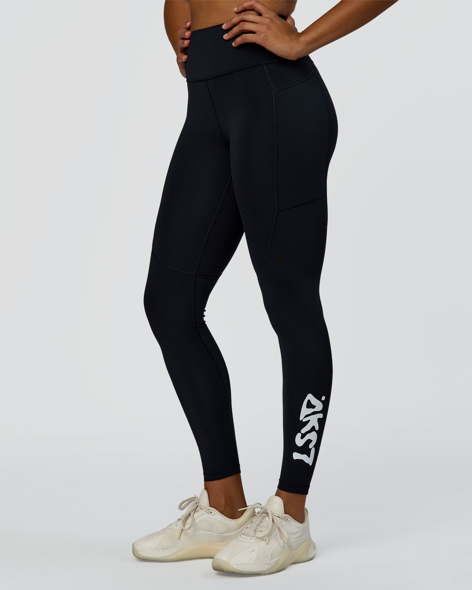 Woman wearing Rep Street Script Ultra High-Rise Full Length Legging Pockets - Black-White | Model:Rosie | Size:S