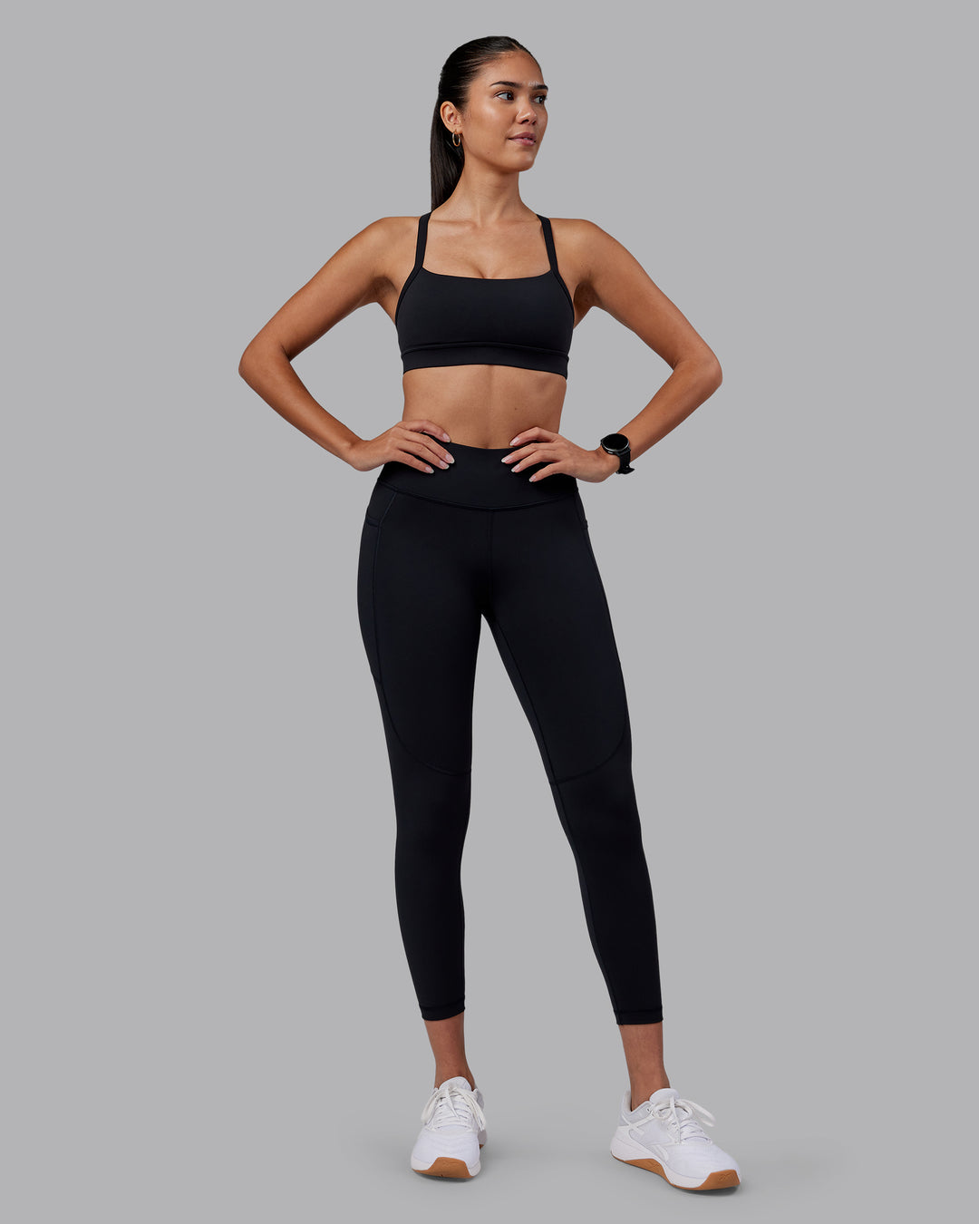 Woman wearing Rep Ultra High-Rise 7/8 Legging Pockets - Black-Black | Model:Rhiley | Size:S - view 3