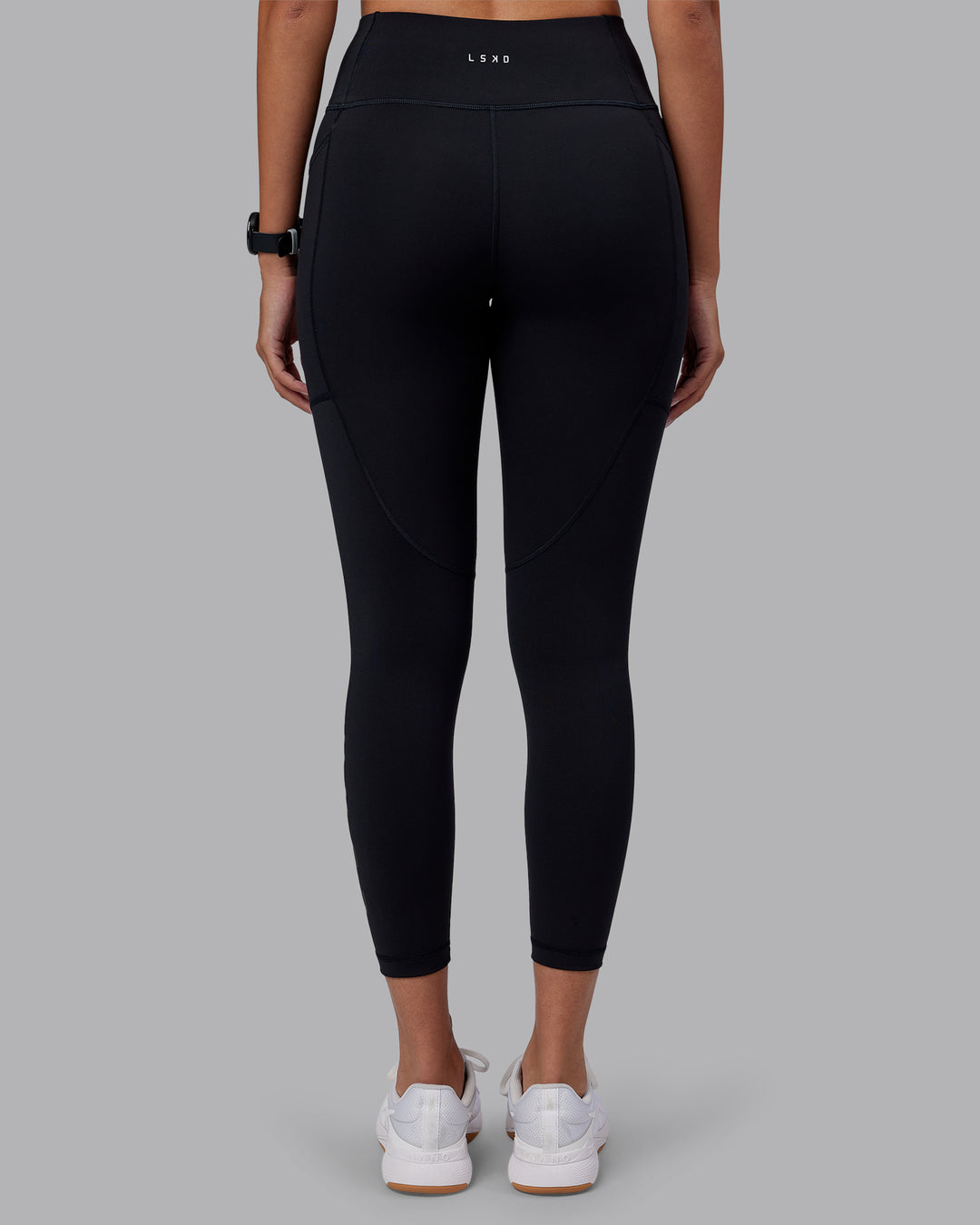 Woman wearing Rep Ultra High-Rise 7/8 Legging Pockets - Black-Black | Model:Rhiley | Size:S - view 4