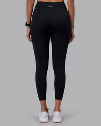 Woman wearing Rep Ultra High-Rise 7/8 Legging Pockets - Black-Black | Model:Rhiley | Size:S | Thumbnail Index: 3