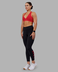 Woman wearing Rep Ultra High-Rise 7/8 Legging Pockets - Black-Scarlet | Model:Keisha | Size:S | Thumbnail Index: 0