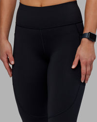 Woman wearing Rep Ultra High-Rise 7/8 Legging Pockets - Black-Scarlet | Model:Keisha | Size:S | Thumbnail Index: 5