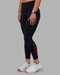 Woman wearing Rep Ultra High-Rise 7/8 Legging Pockets - Black-Scarlet | Model:Keisha | Size:S | Thumbnail Index: 1