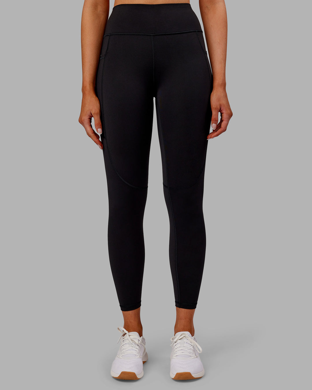 Woman wearing Rep Ultra High-Rise 7/8 Legging Pockets - Black-Ultra Orange | Model:Ella | Size:S - view 7