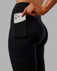 Woman wearing Rep Ultra High-Rise Full Length Legging Pockets - Black-Ultra Orange | Model:Ella | Size:S | Thumbnail Index: 2