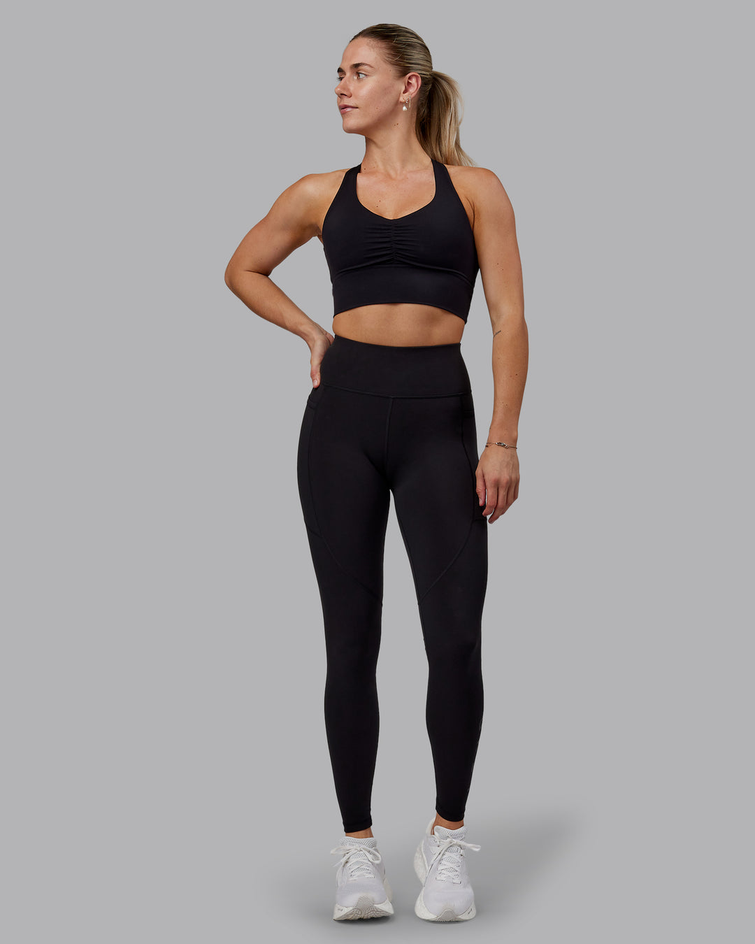 Woman wearing Rep Ultra High-Rise Tall Legging Pockets - Black-Black | Model:Hannah | Size:S - view 1