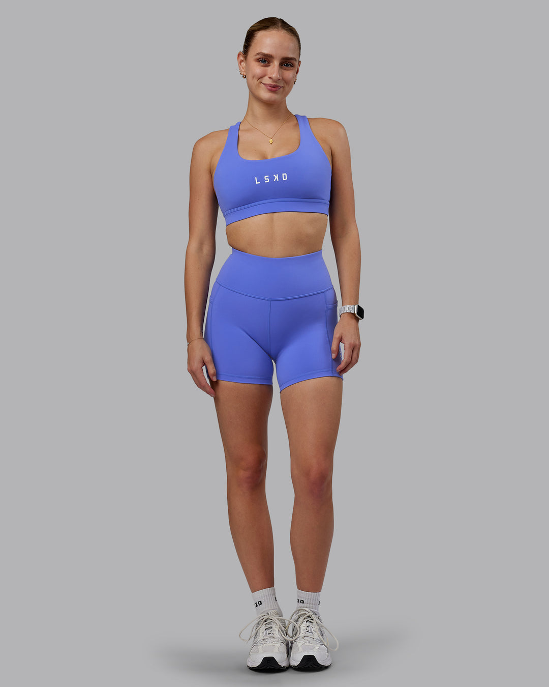 Woman wearing Rep Ultra High-Rise 4" Short Pockets - Baja Blue-White | Model:Lillie | Size:S - view 6