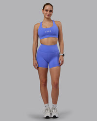Woman wearing Rep Ultra High-Rise 4" Short Pockets - Baja Blue-White | Model:Lillie | Size:S | Thumbnail Index: 5