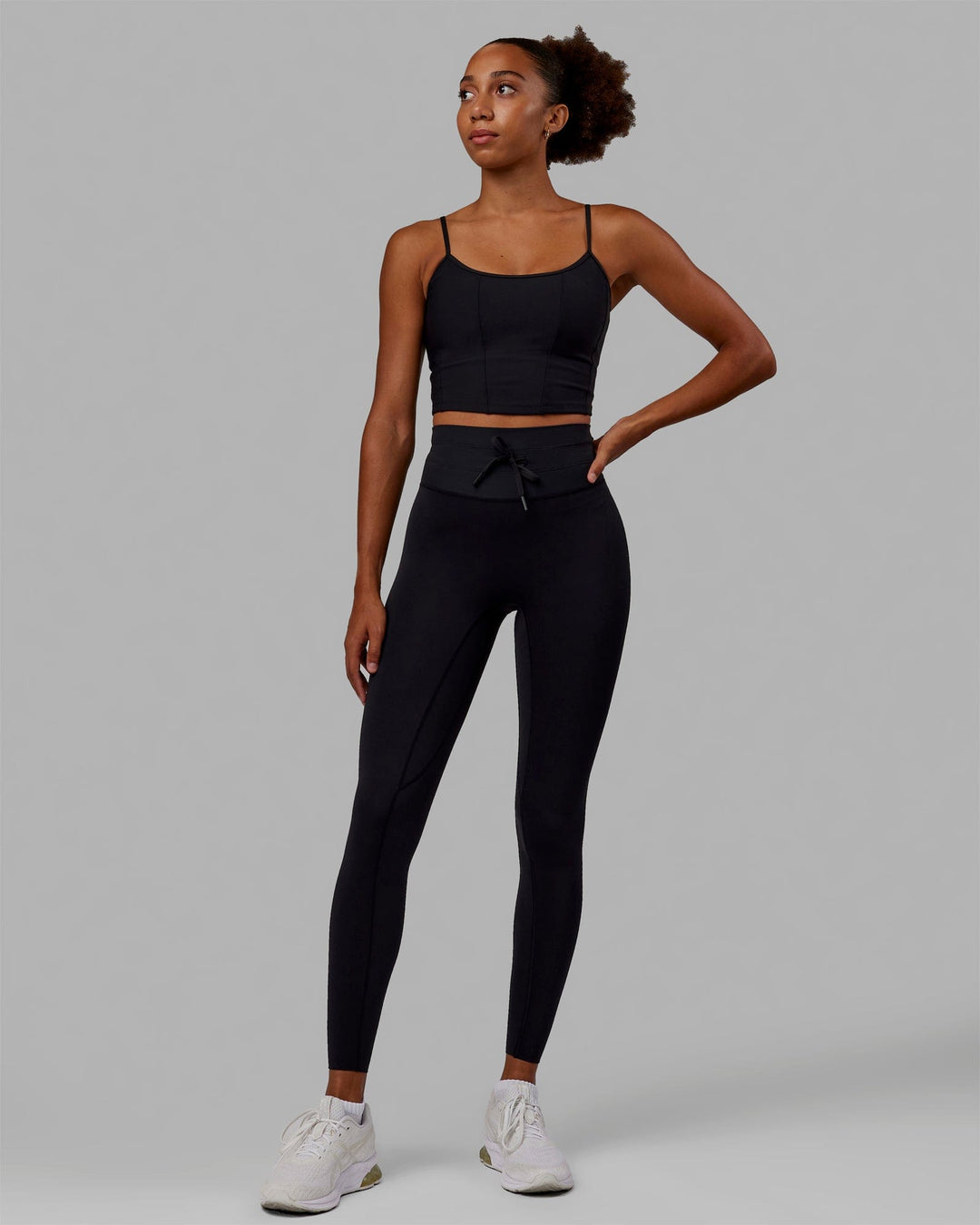 Woman wearing Resistance Ultra High-Rise Full Length Legging - Black - view 8