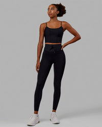 Woman wearing Resistance Ultra High-Rise Full Length Legging - Black | Thumbnail Index: 7
