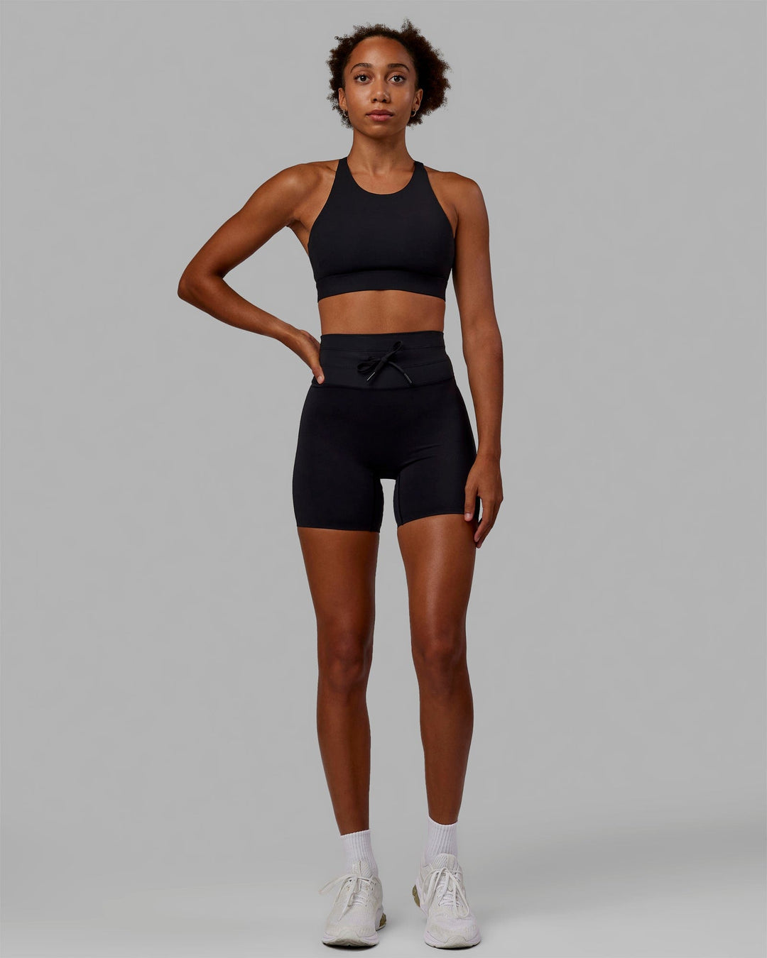 Woman wearing Resistance Ultra High-Rise 6" Short - Black - view 6