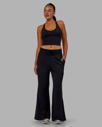 Woman wearing Restore CloudFLX Wide Leg Pants - Black | Thumbnail Index: 2