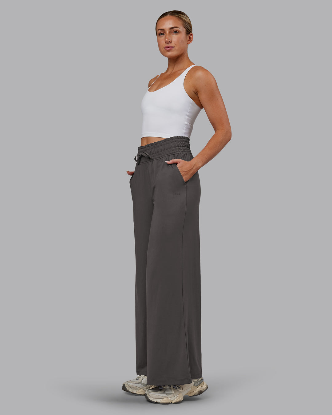 Woman wearing Restore CloudFLX Wide Leg Pant - Dark Storm | Model:Paris | Size:S - view 5