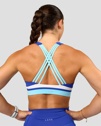 Woman wearing Revitalise Flash Sports Bra - Electric Indigo-Multi | Model:Summer | Size:S | Thumbnail Index: 1