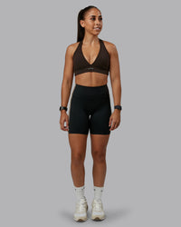 Woman wearing Revitalise Ultra High-Rise 6" Short - Black-Multi | Model:Tylah | Size:S | Thumbnail Index: 1