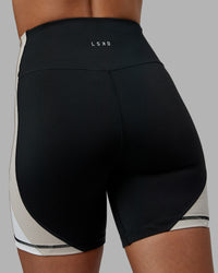 Woman wearing Revitalise Ultra High-Rise 6" Short - Black-Multi | Model:Tylah | Size:S | Thumbnail Index: 7