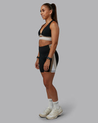 Woman wearing Revitalise Sports Bra - Black-Multi | Model:Tylah | Size:S | Thumbnail Index: 8