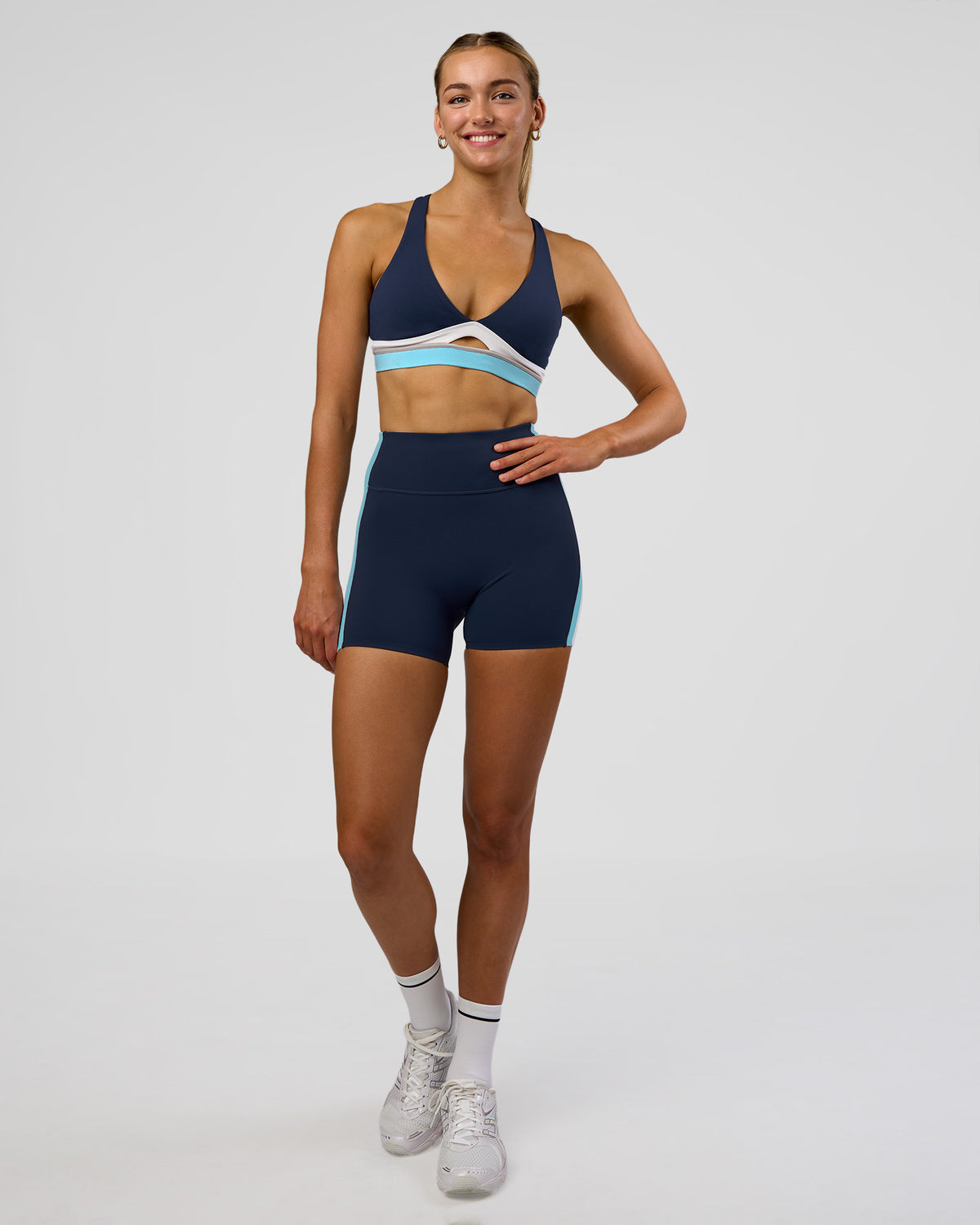 Woman wearing Revitalise Ultra High-Rise 4" Short - Future Navy-Multi | Model:Evie | Size:S