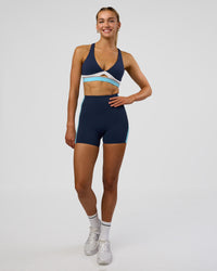 Woman wearing Revitalise Ultra High-Rise 4" Short - Future Navy-Multi | Model:Evie | Size:S | Thumbnail Index: 1