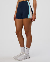 Woman wearing Revitalise Ultra High-Rise 4" Short - Future Navy-Multi | Model:Evie | Size:S | Thumbnail Index: 0