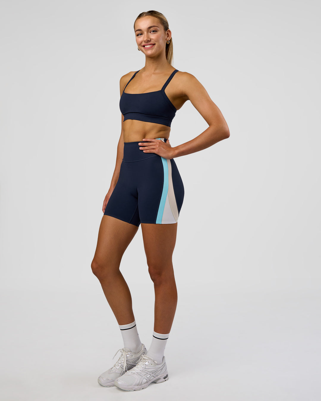 Woman wearing Revitalise Ultra High-Rise 6" Short - Future Navy-Multi | Model:Evie | Size:S - view 2