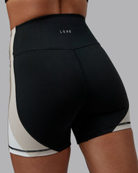 Woman wearing Revitalise Ultra High-Rise 4" Short - Black-Multi | Model:Tylah | Size:S | Thumbnail Index: 6