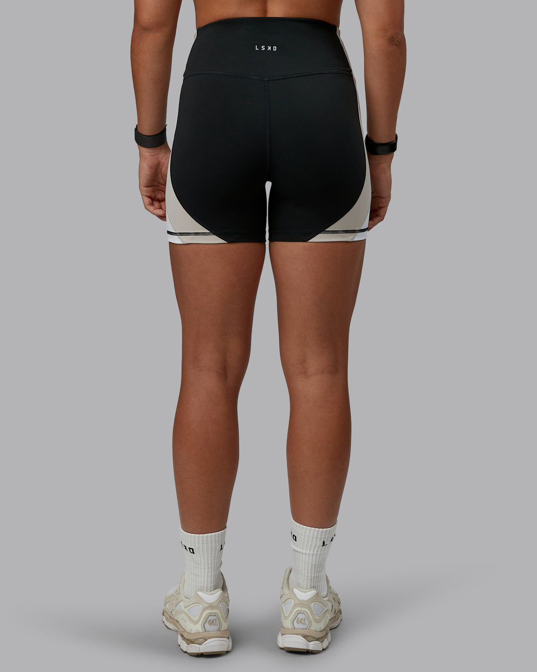 Woman wearing Revitalise Ultra High-Rise 4" Short - Black-Multi | Model:Tylah | Size:S - view 4
