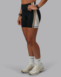 Woman wearing Revitalise Ultra High-Rise 4" Short - Black-Multi | Model:Tylah | Size:S | Thumbnail Index: 0