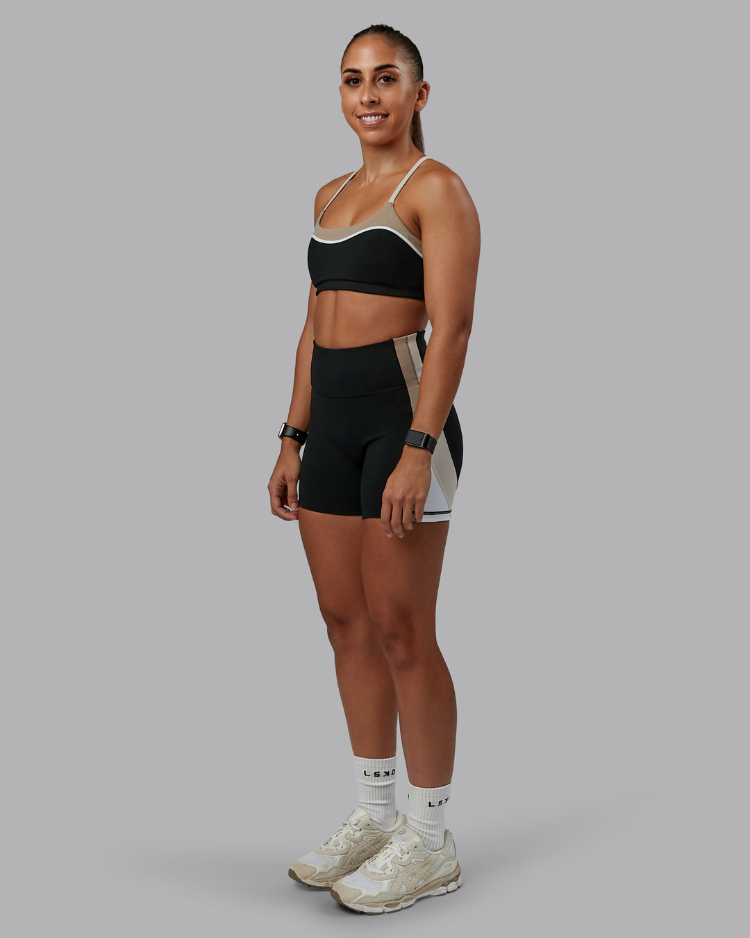 Woman wearing Revitalise Ultra High-Rise 4" Short - Black-Multi | Model:Tylah | Size:S - view 5
