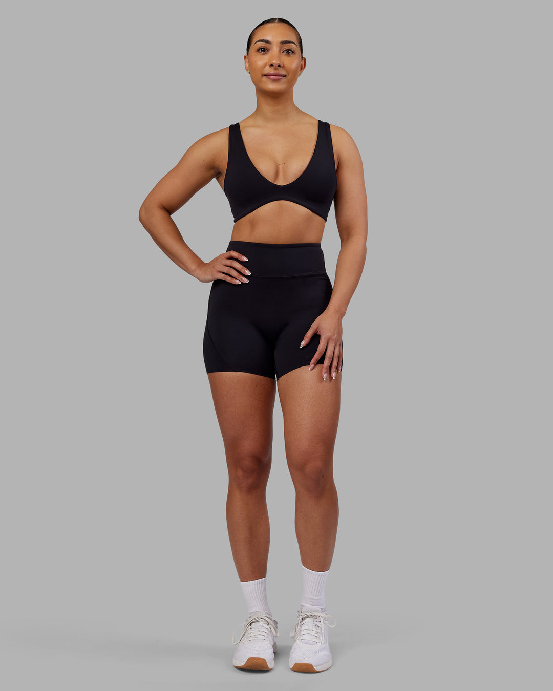 Woman wearing Rhythm Elixir Ultra High-Rise 4" Short - Black | Model:Ayla | Size:S - view 7