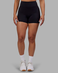 Woman wearing Rhythm Elixir Ultra High-Rise 4" Short - Black | Model:Ayla | Size:S | Thumbnail Index: 5