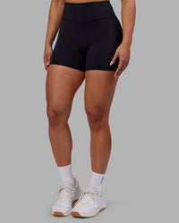 Woman wearing Rhythm Elixir Ultra High-Rise 4" Short - Black | Model:Ayla | Size:S | Thumbnail Index: 2