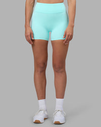 Woman wearing Rhythm Elixir Ultra High-Rise 4" Short - Island Paradise | Model:Sophie | Size:S | Thumbnail Index: 0