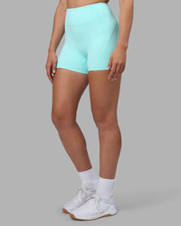 Woman wearing Rhythm Elixir Ultra High-Rise 4" Short - Island Paradise | Model:Sophie | Size:S | Thumbnail Index: 2