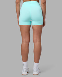 Woman wearing Rhythm Elixir Ultra High-Rise 4" Short - Island Paradise | Model:Sophie | Size:S | Thumbnail Index: 6