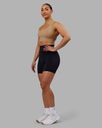 Woman wearing Rhythm Elixir Ultra High-Rise 6" Short Pockets - Black | Model:Ayla | Size:S | Thumbnail Index: 5