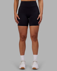 Woman wearing Rhythm Elixir Ultra High-Rise 6" Short Pockets - Black | Model:Ayla | Size:S | Thumbnail Index: 3