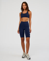 Woman wearing Rep Ultra High-Rise 9" Short Pockets - Future Navy-White | Model:Dakota | Size:S | Thumbnail Index: 6