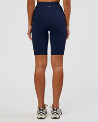 Woman wearing Rep Ultra High-Rise 9" Short Pockets - Future Navy-White | Model:Dakota | Size:S | Thumbnail Index: 3