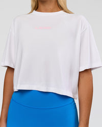 Woman wearing Run Fast Lift Heavy FLXCotton Cropped Tee - White | Model:Amity | Size:S | Thumbnail Index: 5
