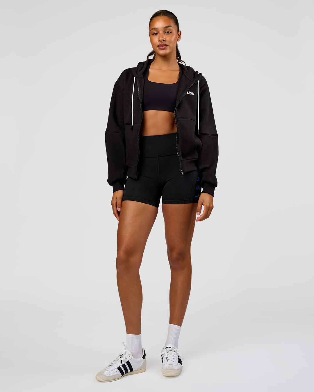 Woman wearing Run Fast Lift Heavy Hoodie - Black-White | Model:Rosie | Size:S - view 3
