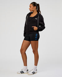Woman wearing Run Fast Lift Heavy Hoodie - Black-White | Model:Rosie | Size:S | Thumbnail Index: 4
