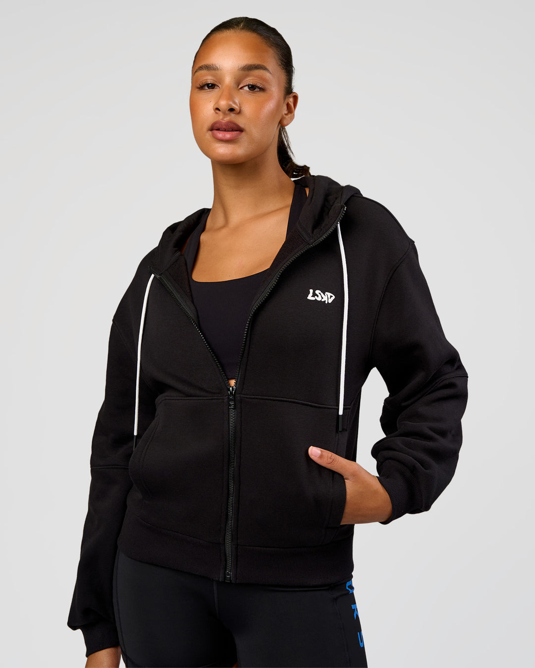 Woman wearing Run Fast Lift Heavy Hoodie - Black-White | Model:Rosie | Size:S - view 2